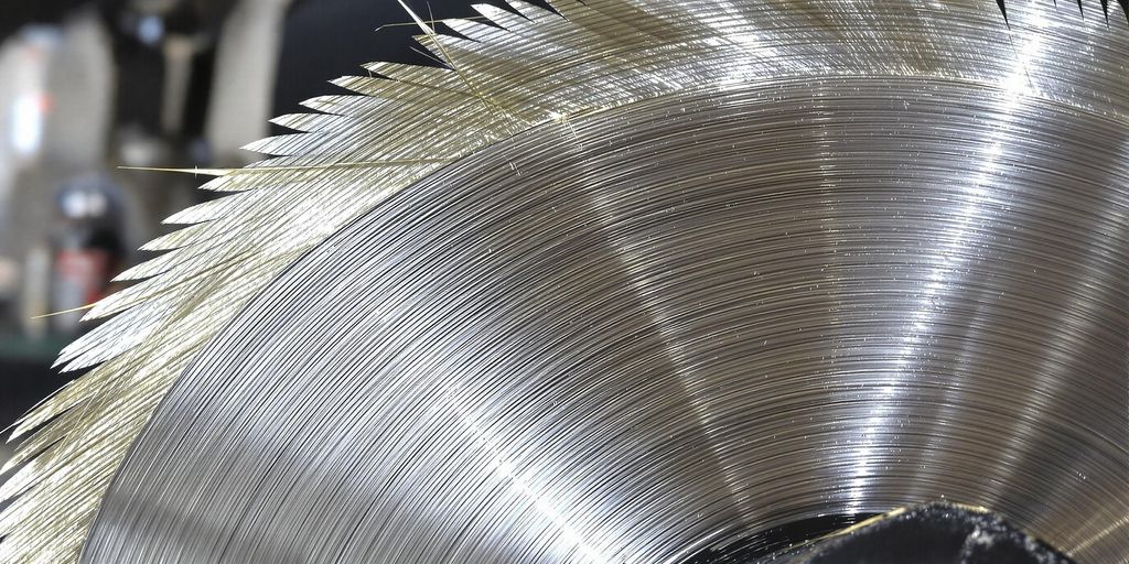 Close-up of a steel cutter disc on a power tool.
